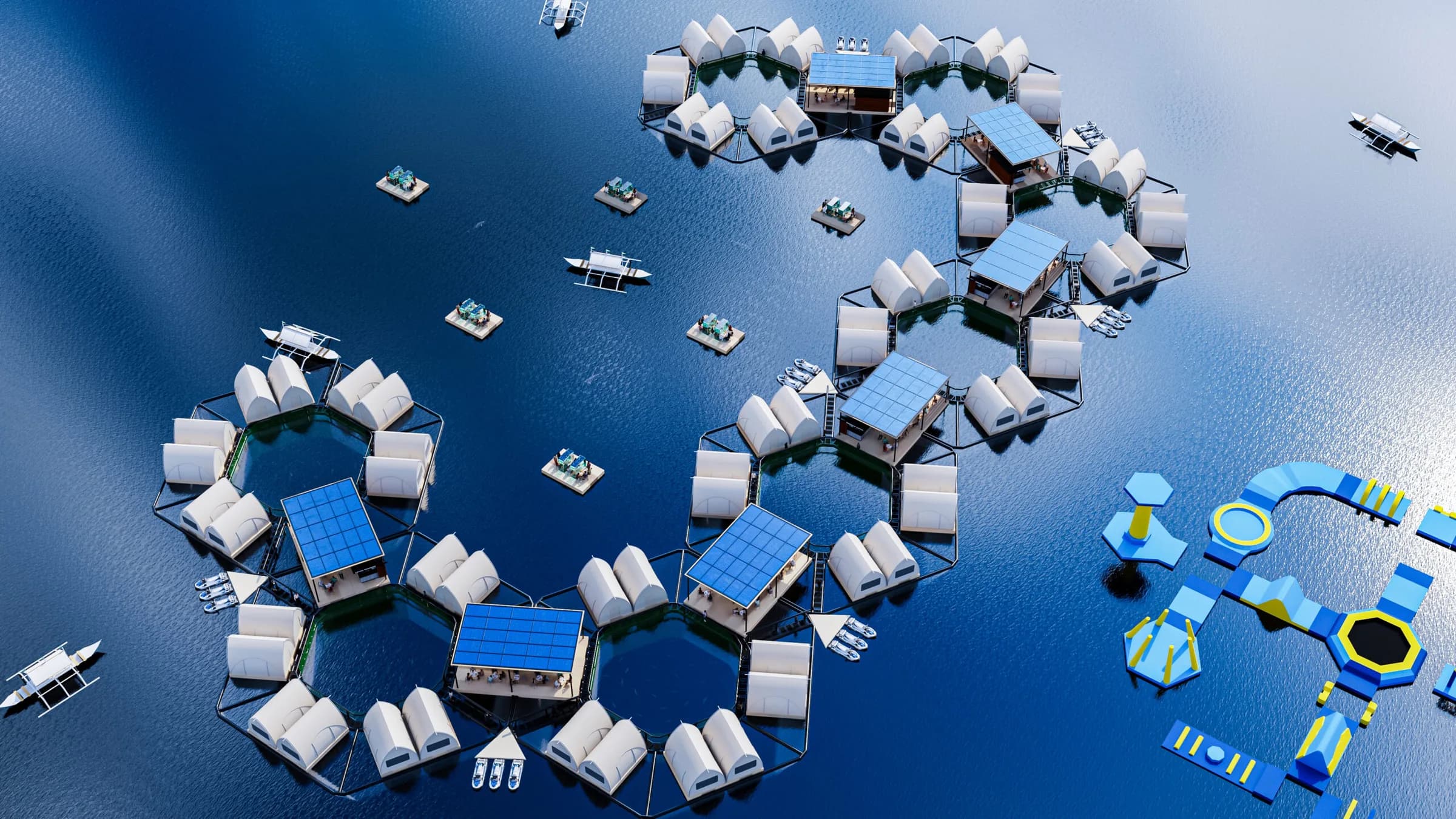 High aerial render of the Reef Resort's hexagonal modules on dark blue water, each ring of cabins enclosing a central fish pen