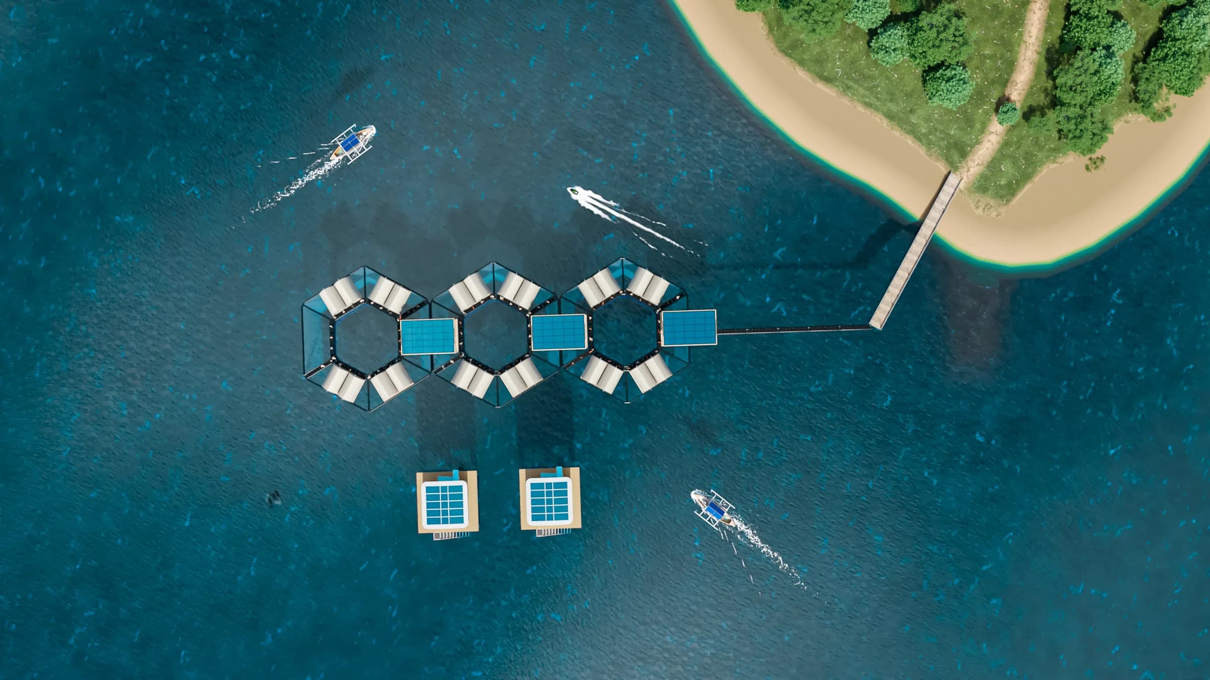 Straight-down aerial of two hexagonal rings of white Glamphouses around blue decks, linked by a walkway to a sandy beach and pier, with two detached ArkPad units below and small boats on turquoise water